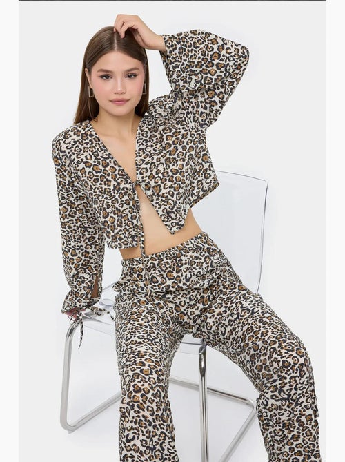 Conjunto de cintura alta con escote en v y estampado animal hiccup - Kiabi Conjunto de cintura alta con escote en v y estampado animal hiccup - Kiabi