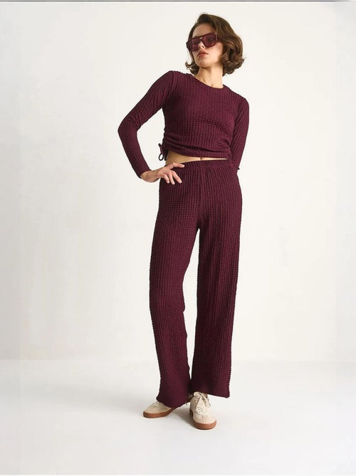 Conjunto de dos piezas ajustado con pantalones acampanados lucci - Kiabi Conjunto de dos piezas ajustado con pantalones acampanados lucci - Kiabi