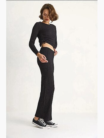 Conjunto de dos piezas ajustado con pantalones acampanados lucci