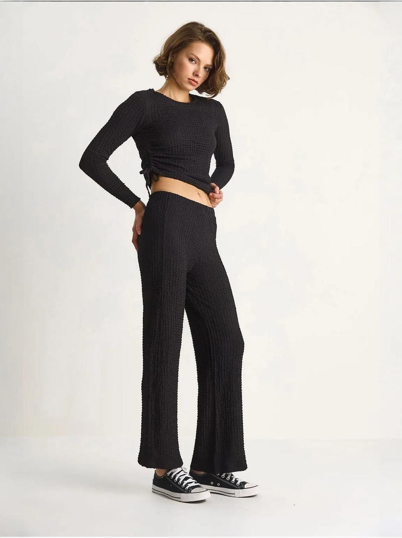 Conjunto de dos piezas ajustado con pantalones acampanados lucci Negro - Kiabi