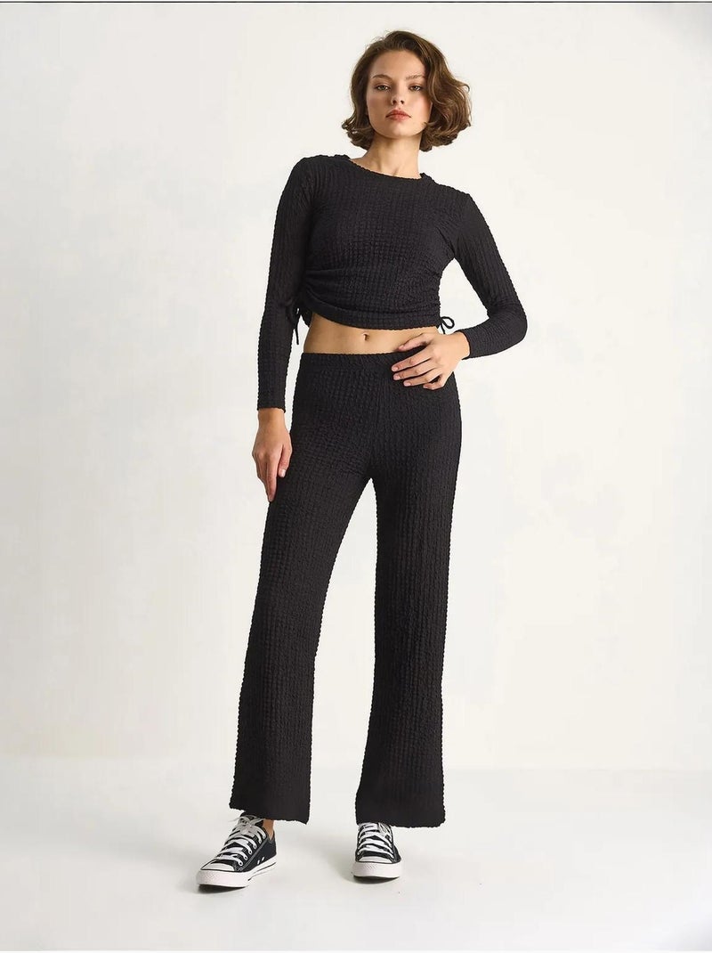 Conjunto de dos piezas ajustado con pantalones acampanados lucci Negro - Kiabi