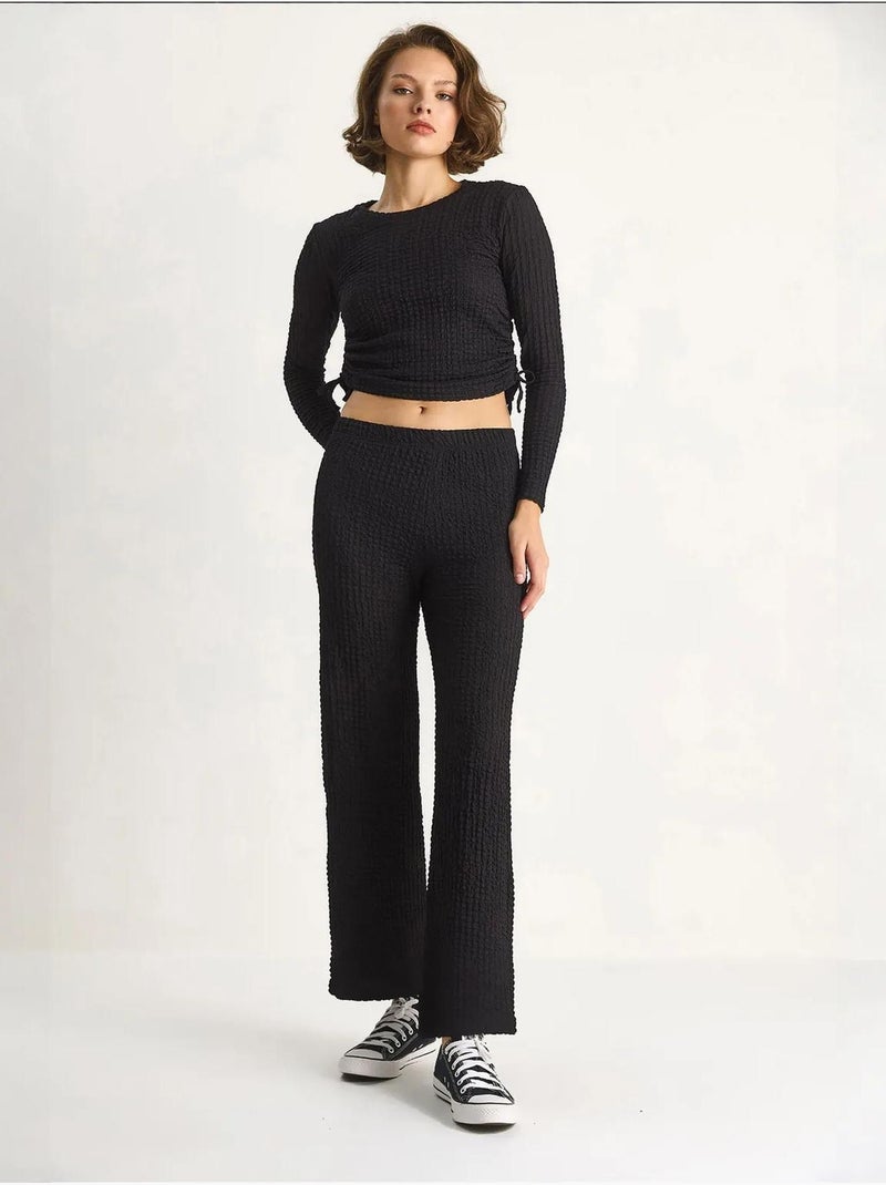 Conjunto de dos piezas ajustado con pantalones acampanados lucci Negro - Kiabi