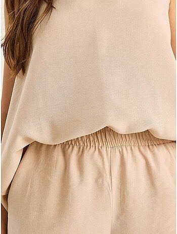 Conjunto de dos piezas con blusa de tirantes y cuello en v y pantalón palazzo lucci