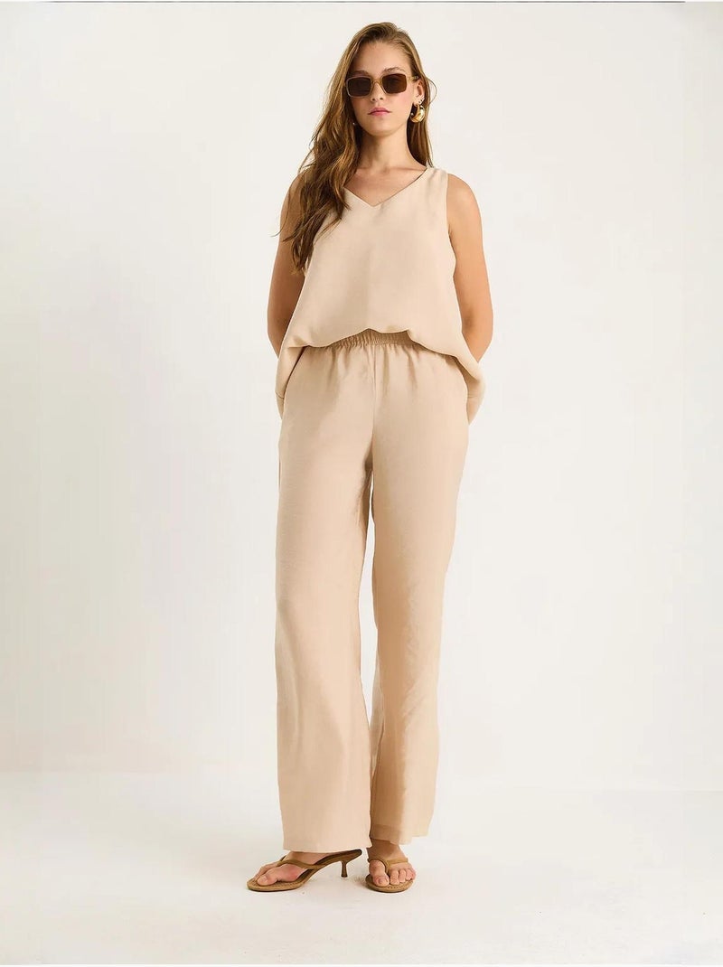 Conjunto de dos piezas con blusa de tirantes y cuello en v y pantalón palazzo lucci Beige arcilla - Kiabi