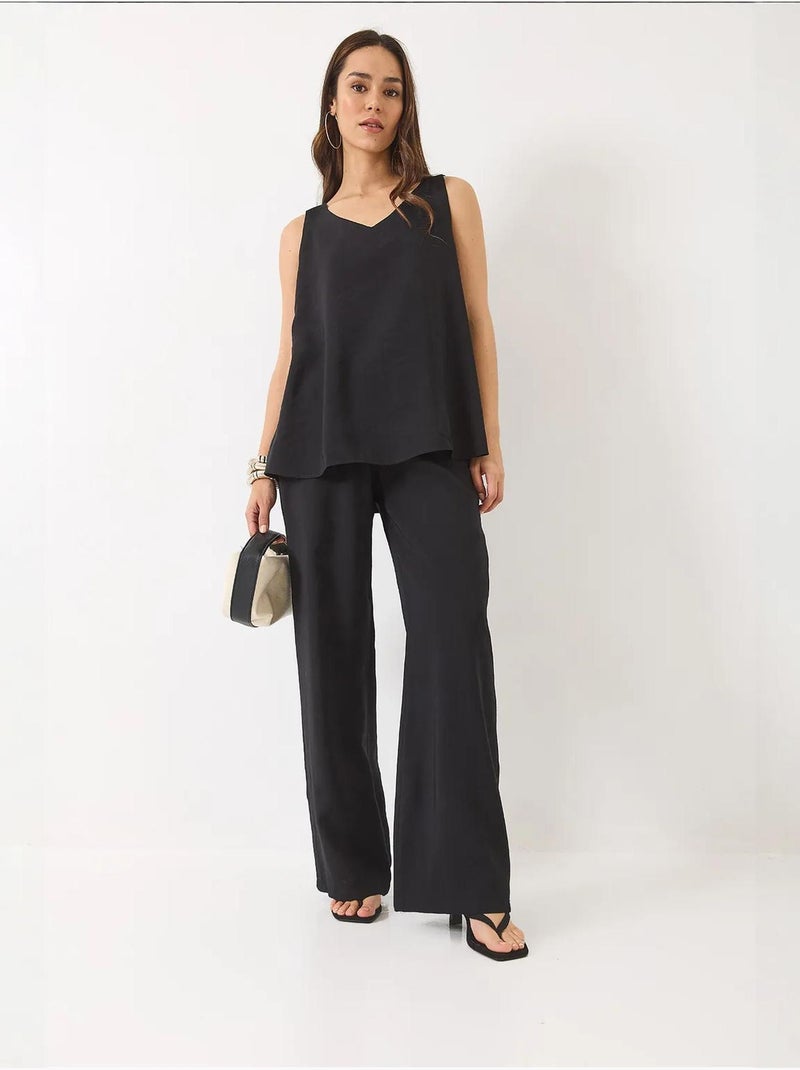Conjunto de dos piezas con blusa de tirantes y cuello en v y pantalón palazzo lucci Negro - Kiabi