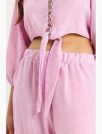 Conjunto de dos piezas con blusa y pantalón abotonado con detalle de lazo de bianco lucci