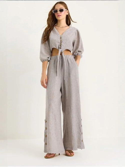 Conjunto de dos piezas con blusa y pantalón abotonado con detalle de lazo lucci - Kiabi