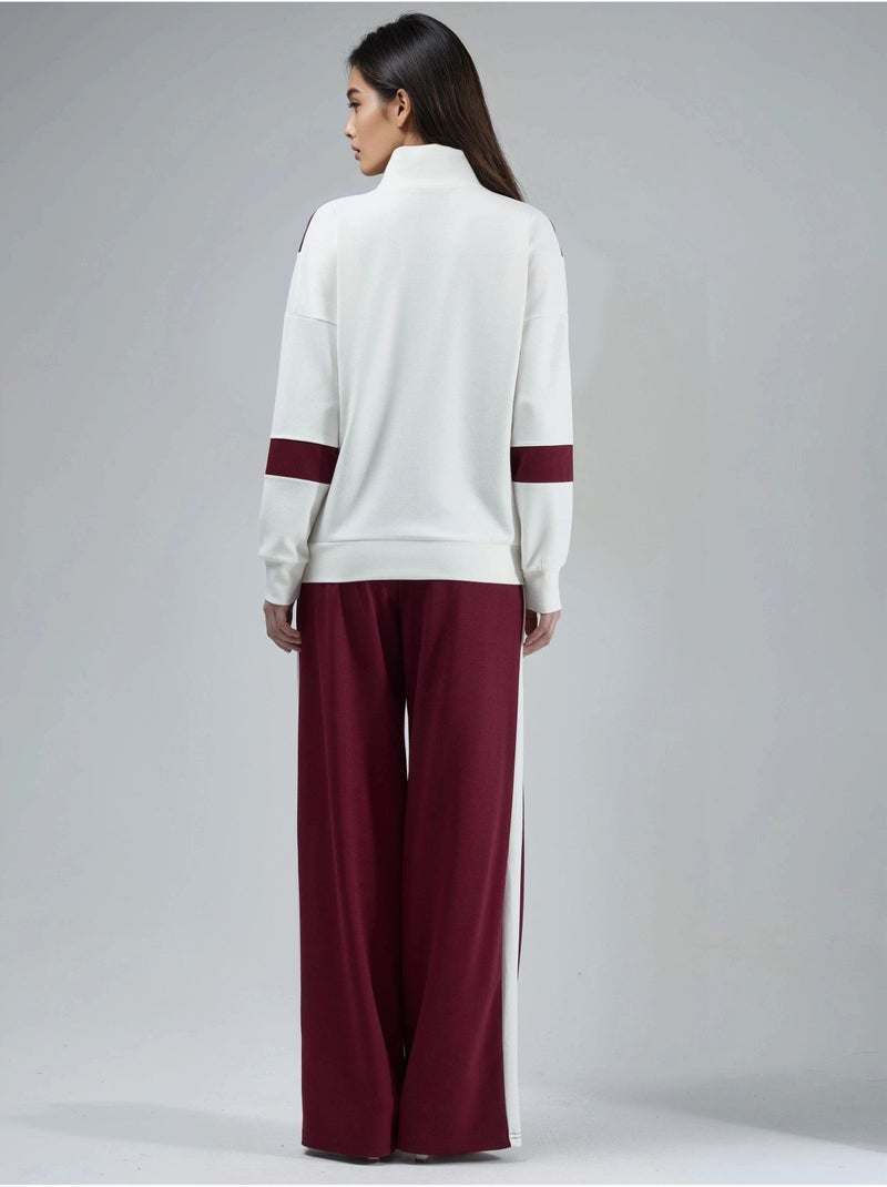 Conjunto de dos piezas con cuello con cremallera y pernera ancha y larga con bloques de color hiccup Rojo burdeos - Kiabi