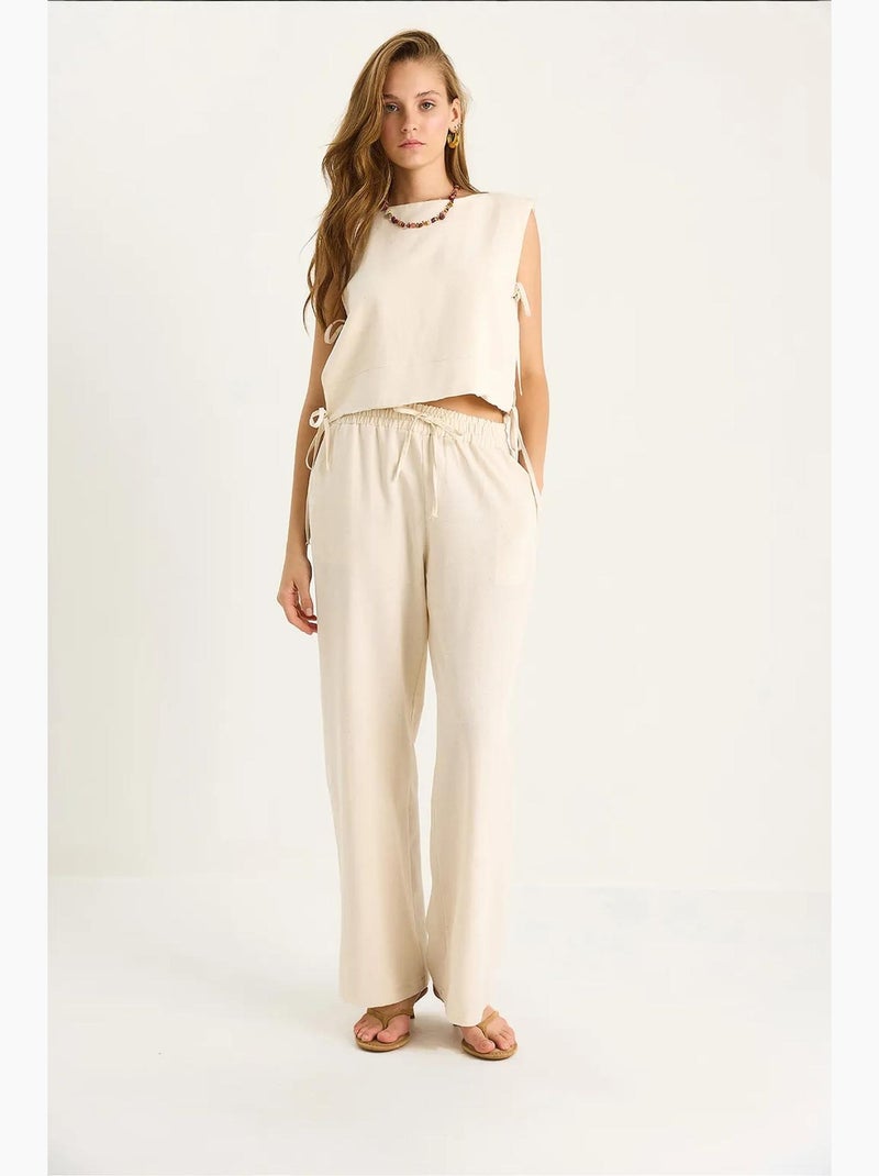 Conjunto de dos piezas con cuello redondo, cierre de lazo y pantalones de pierna ancha lucci Beige arcilla - Kiabi