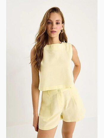 Conjunto de dos piezas con cuello redondo, sin mangas y cintura alta lucci