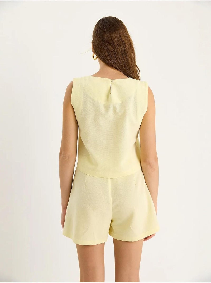Conjunto de dos piezas con cuello redondo, sin mangas y cintura alta lucci Amarillo limón - Kiabi