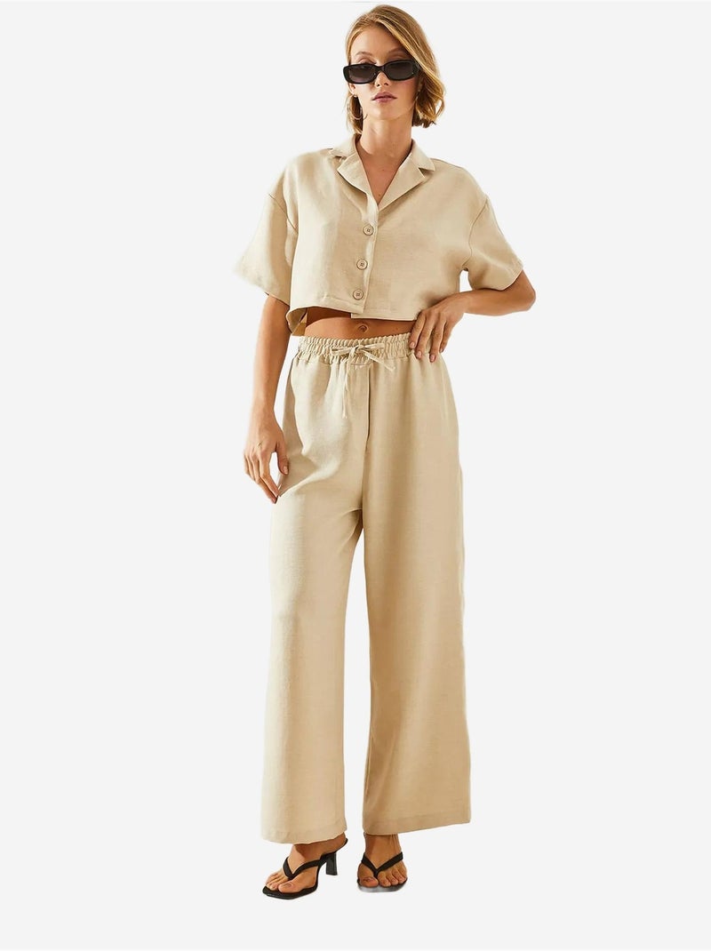 Conjunto de dos piezas con top corto, pantalón abotonado y bolsillos lucci Beige arcilla - Kiabi