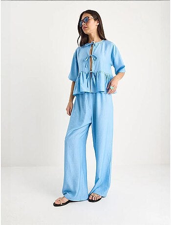 Conjunto de dos piezas de blusa y pantalón de manga corta con detalle de lazo lucci