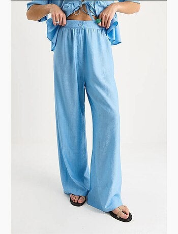 Conjunto de dos piezas de blusa y pantalón de manga corta con detalle de lazo lucci