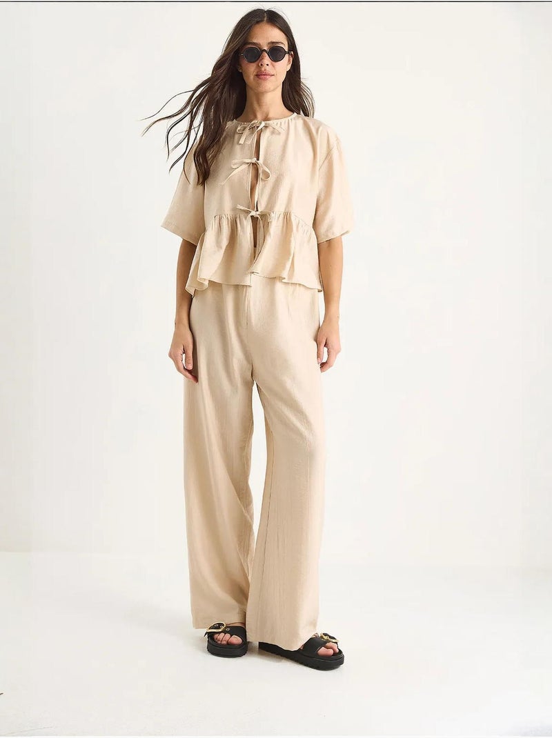 Conjunto de dos piezas de blusa y pantalón de manga corta con detalle de lazo lucci Beige arcilla - Kiabi