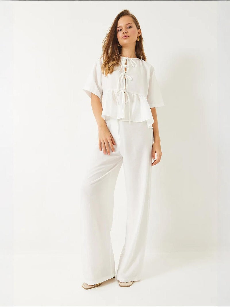 Conjunto de dos piezas de blusa y pantalón de manga corta con detalle de lazo lucci Blanco - Kiabi
