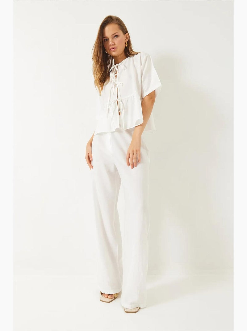 Conjunto de dos piezas de blusa y pantalón de manga corta con detalle de lazo lucci Blanco - Kiabi