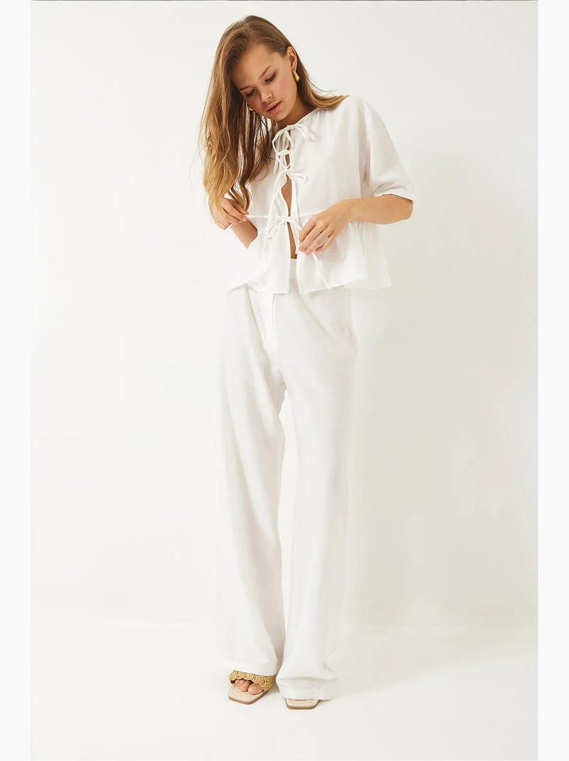 Conjunto de dos piezas de blusa y pantalón de manga corta con detalle de lazo lucci Blanco - Kiabi