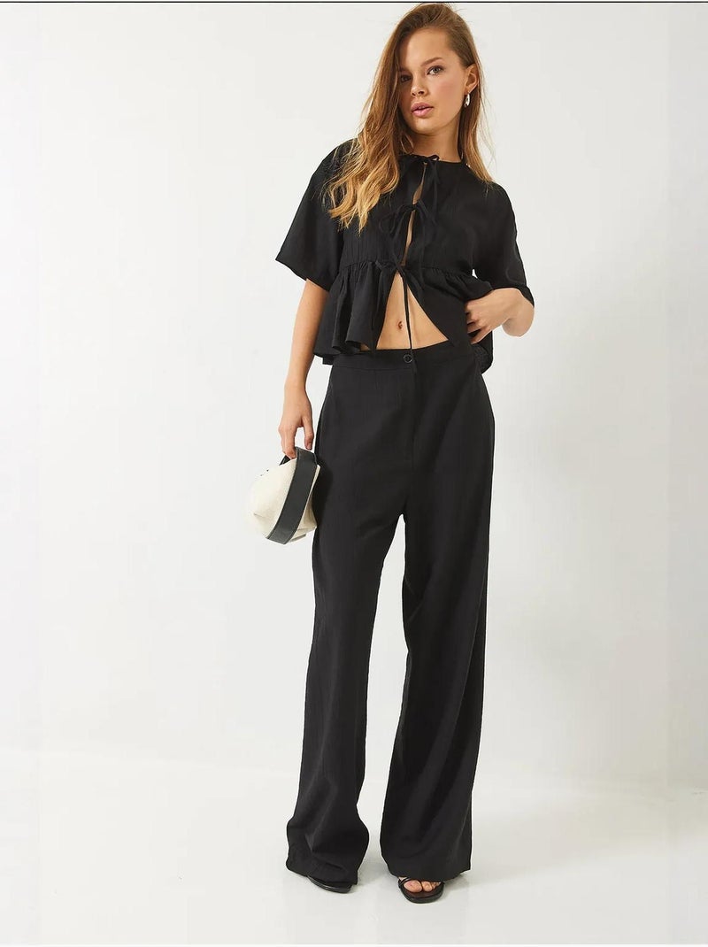 Conjunto de dos piezas de blusa y pantalón de manga corta con detalle de lazo lucci Negro - Kiabi