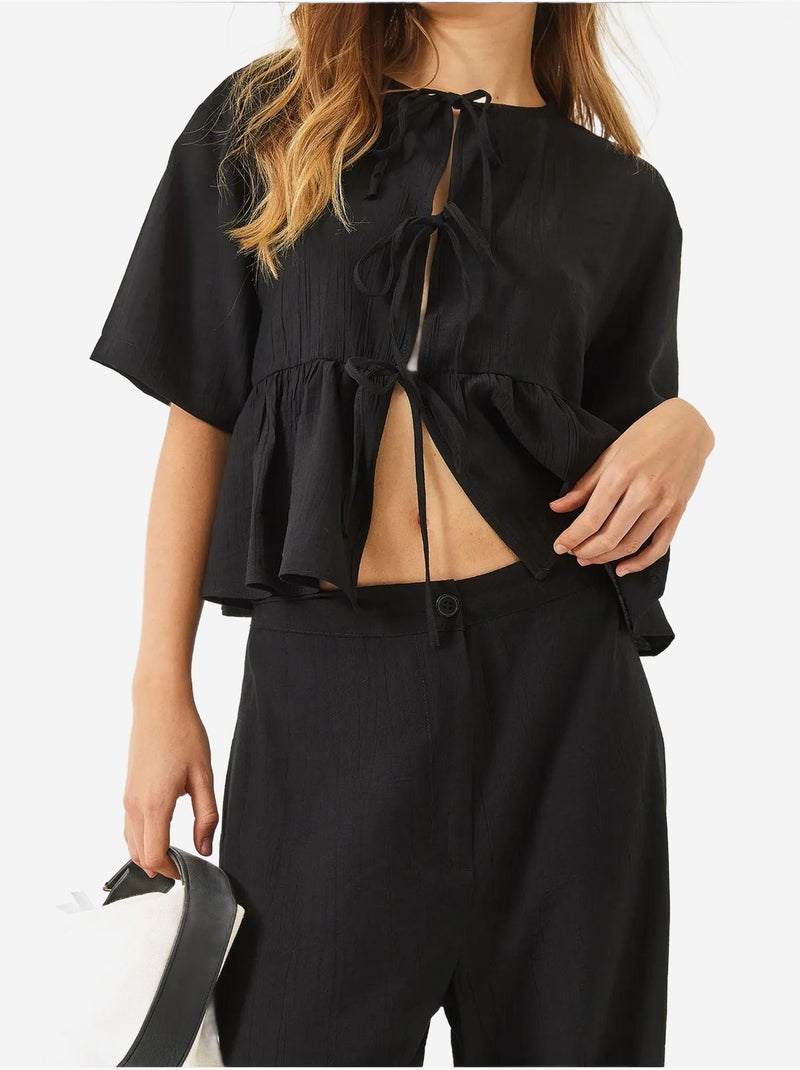 Conjunto de dos piezas de blusa y pantalón de manga corta con detalle de lazo lucci Negro - Kiabi