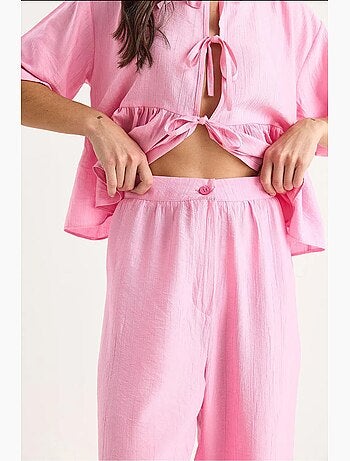 Conjunto de dos piezas de blusa y pantalón de manga corta con detalle de lazo lucci