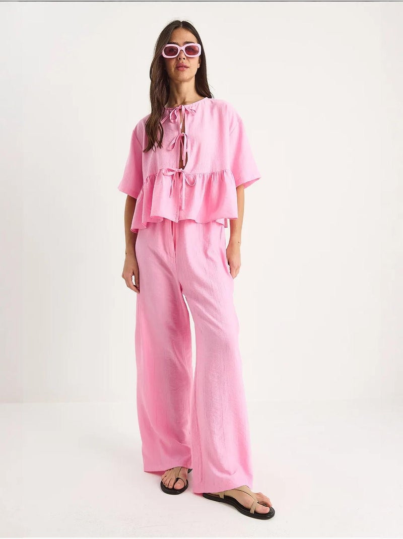 Conjunto de dos piezas de blusa y pantalón de manga corta con detalle de lazo lucci Rosa claro - Kiabi