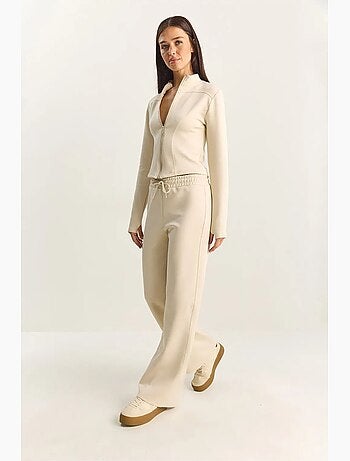 Conjunto de dos piezas de cintura alta con cuello alto y pantalones de pierna ancha lucci