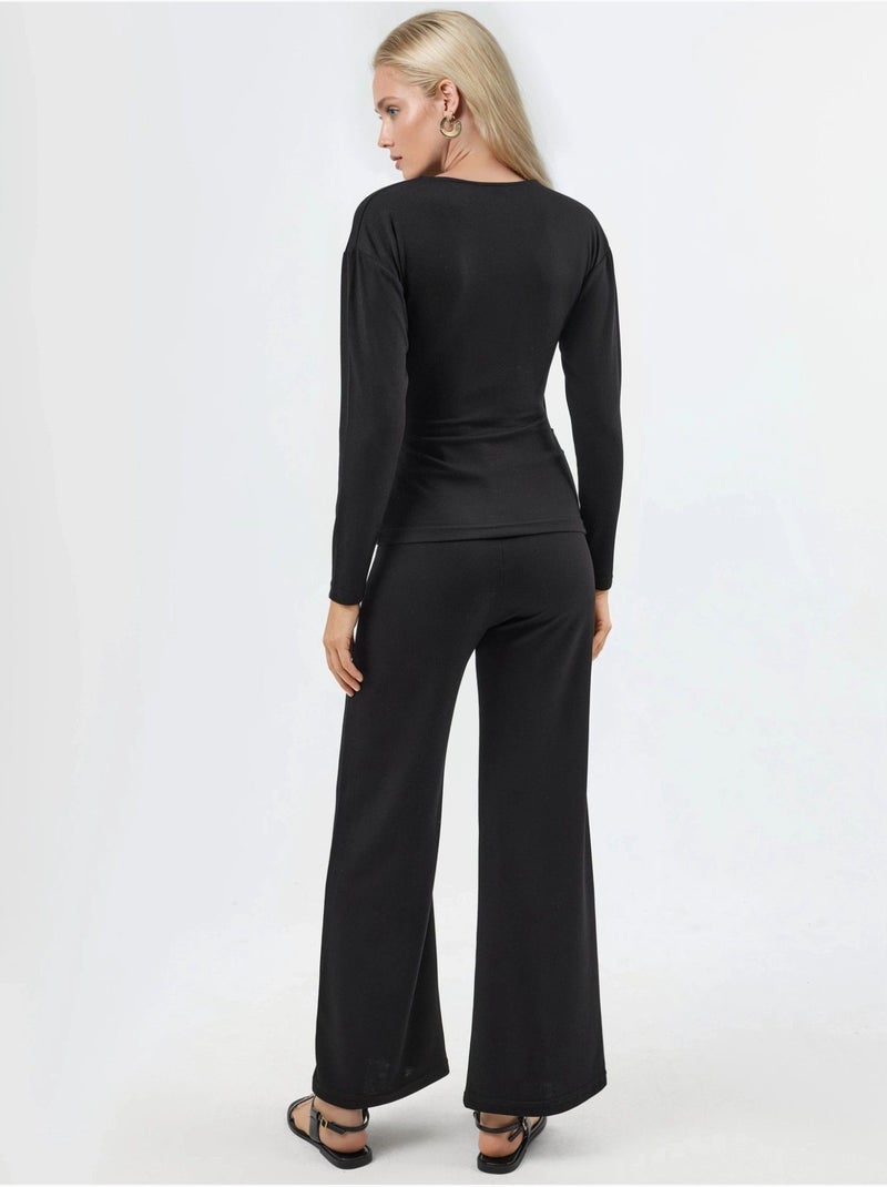 Conjunto de dos piezas de cintura alta y pierna ancha con blusa cruzada hiccup Negro - Kiabi