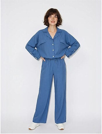 Conjunto de dos piezas de crepé con blusa y pantalón de pernera ancha lucci