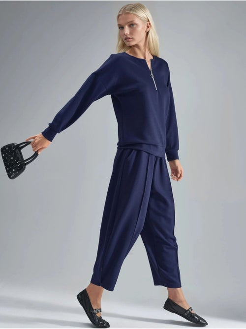 Conjunto de dos piezas de punto con cuello con cremallera y pierna ancha hiccup - Kiabi Conjunto de dos piezas de punto con cuello con cremallera y pierna ancha hiccup - Kiabi