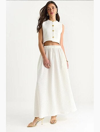 Conjunto de falda larga y chaleco corto con cintura elástica y detalles de bolsillos lucci