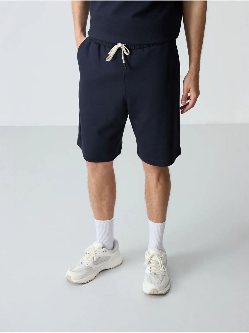 Conjunto de hombre de camiseta oversize y shorts de mezcla de algodón tommy Azul marino - Kiabi