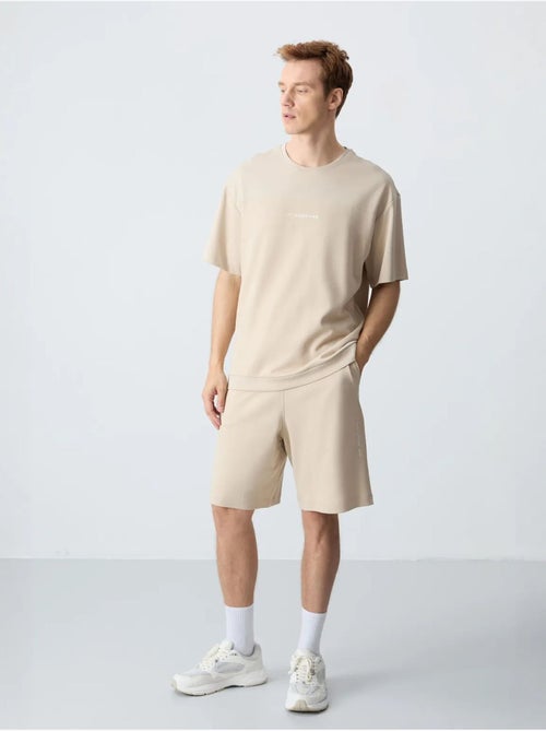 Conjunto de hombre de camiseta oversize y shorts de mezcla de algodón tommy - Kiabi