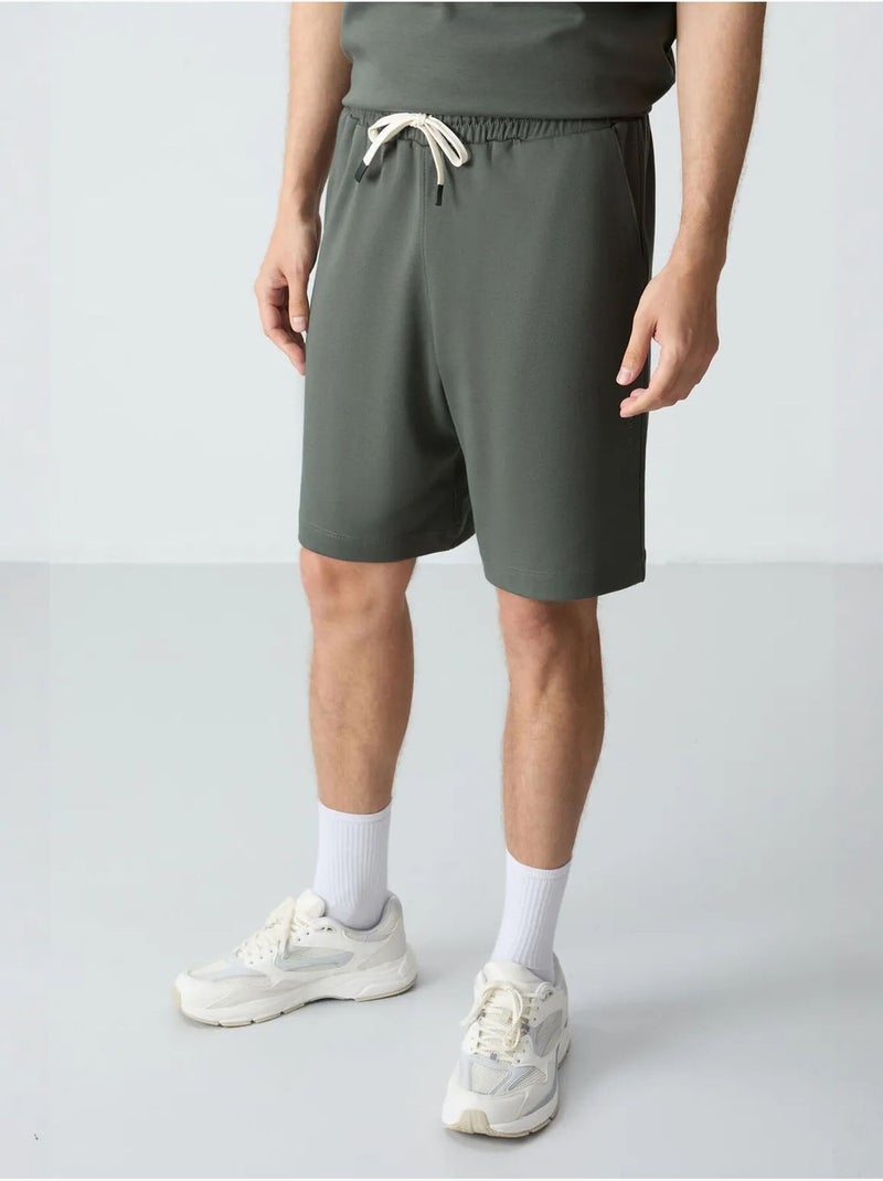 Conjunto de hombre de camiseta oversize y shorts de mezcla de algodón tommy Caqui - Kiabi