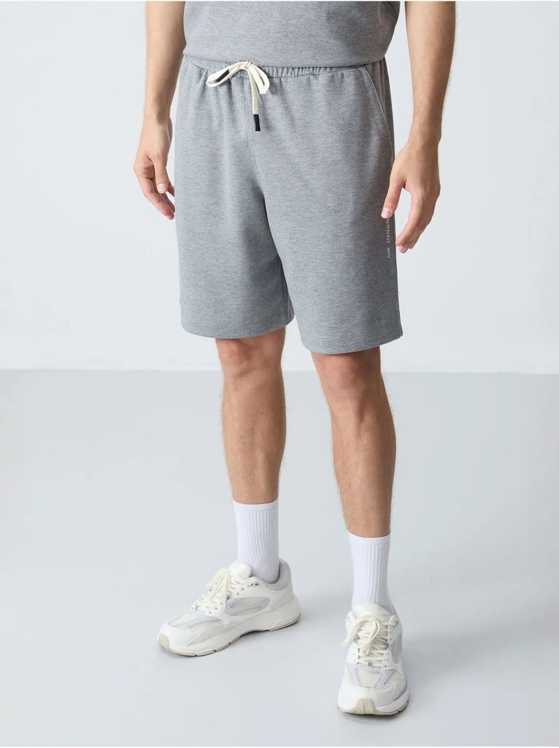 Conjunto de hombre de camiseta oversize y shorts de mezcla de algodón tommy Gris - Kiabi