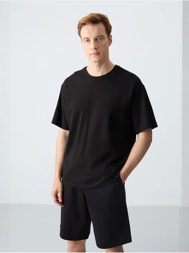 Conjunto de hombre de camiseta oversize y shorts de mezcla de algodón tommy Negro - Kiabi