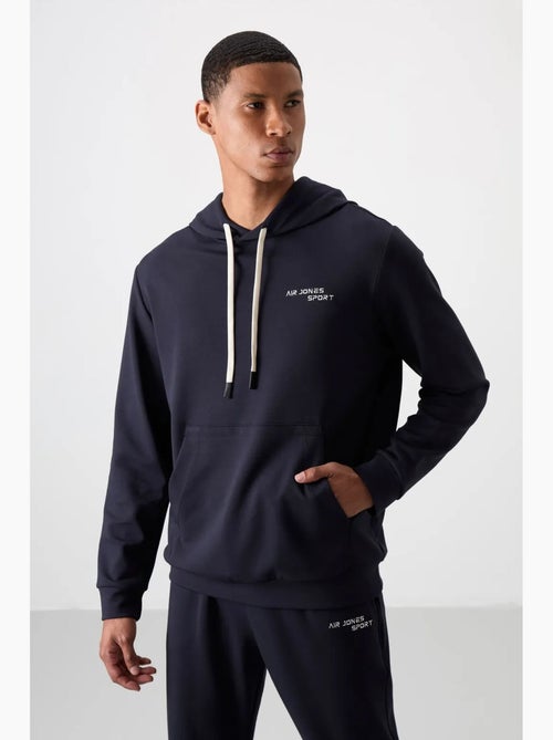 Conjunto de hombre de sudadera con capucha y pantalón tommy - Kiabi Conjunto de hombre de sudadera con capucha y pantalón tommy - Kiabi