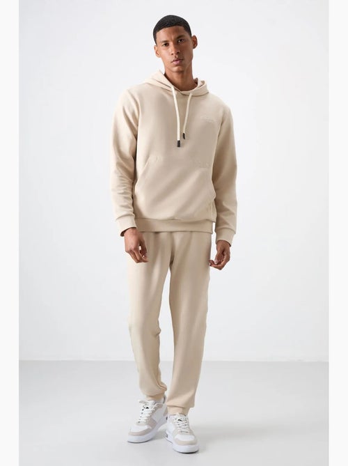 Conjunto de hombre de sudadera con capucha y pantalón tommy - Kiabi Conjunto de hombre de sudadera con capucha y pantalón tommy - Kiabi