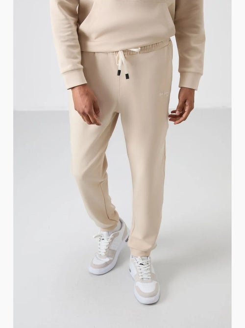 Conjunto de hombre de sudadera con capucha y pantalón tommy - Kiabi Conjunto de hombre de sudadera con capucha y pantalón tommy - Kiabi