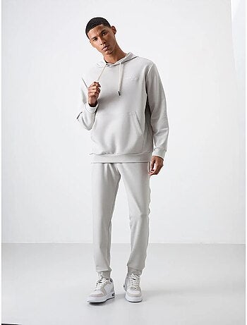 Conjunto de hombre de sudadera con capucha y pantalón tommy