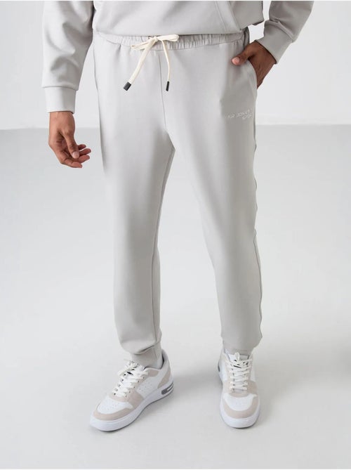 Conjunto de hombre de sudadera con capucha y pantalón tommy - Kiabi Conjunto de hombre de sudadera con capucha y pantalón tommy - Kiabi