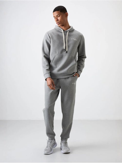 Conjunto de hombre de sudadera con capucha y pantalón tommy - Kiabi