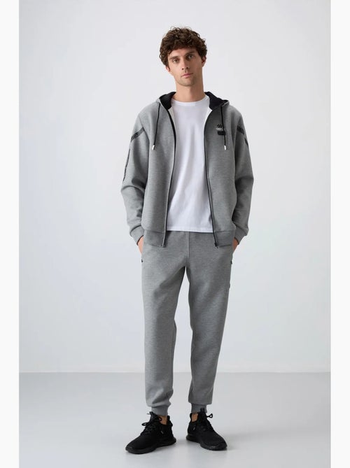 Conjunto de hombre de sudadera con capucha y pantalón tommy - Kiabi Conjunto de hombre de sudadera con capucha y pantalón tommy - Kiabi