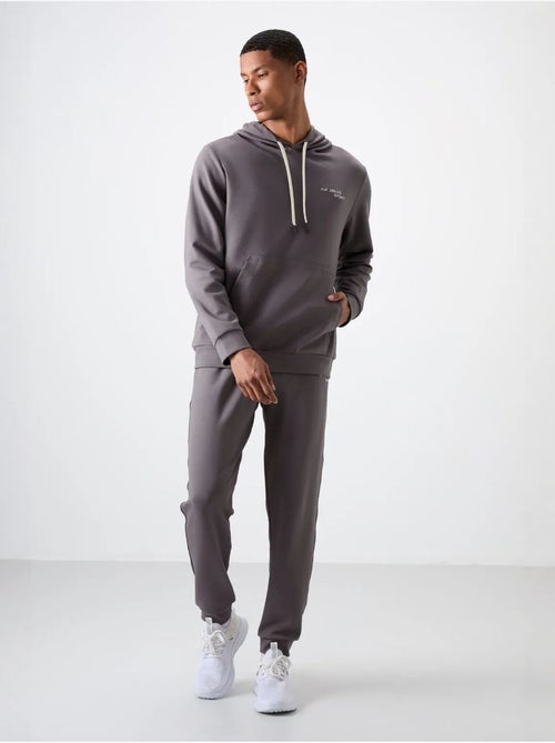Conjunto de hombre de sudadera con capucha y pantalón tommy - Kiabi