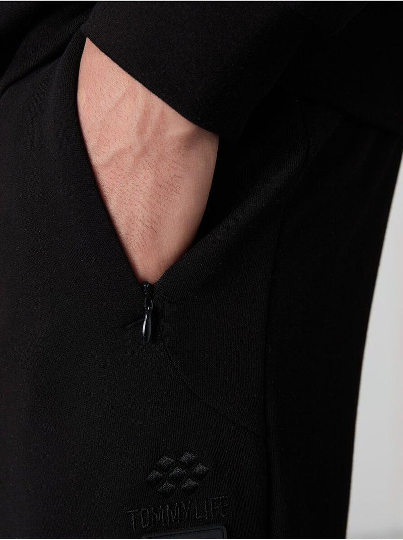 Conjunto de hombre de sudadera con capucha y pantalón tommy Negro - Kiabi