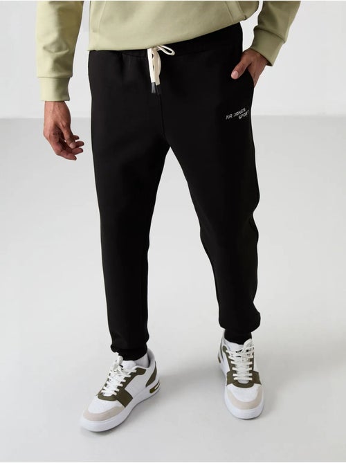 Conjunto de hombre de sudadera con capucha y pantalón tommy - Kiabi Conjunto de hombre de sudadera con capucha y pantalón tommy - Kiabi