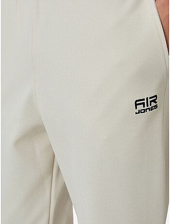 Conjunto de hombre de sudadera con cuello con cremallera y pantalón tommy