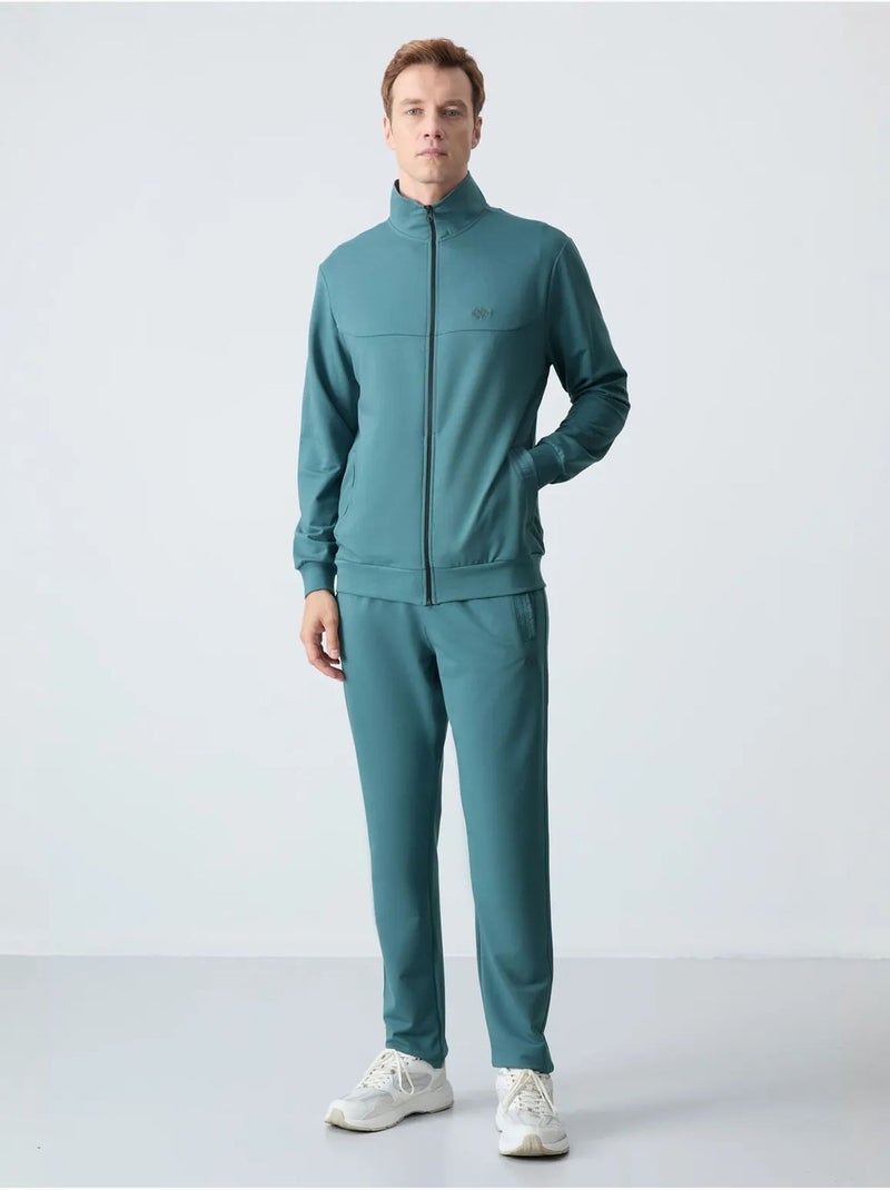 Conjunto de hombre de sudadera con cuello con cremallera y pantalón tommy Azul petróleo - Kiabi