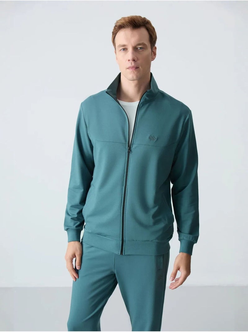 Conjunto de hombre de sudadera con cuello con cremallera y pantalón tommy Azul petróleo - Kiabi
