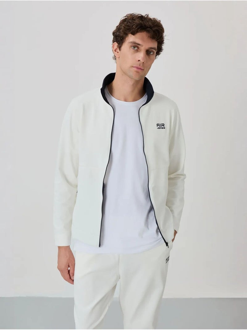 Conjunto de hombre de sudadera con cuello con cremallera y pantalón tommy Blanco roto - Kiabi